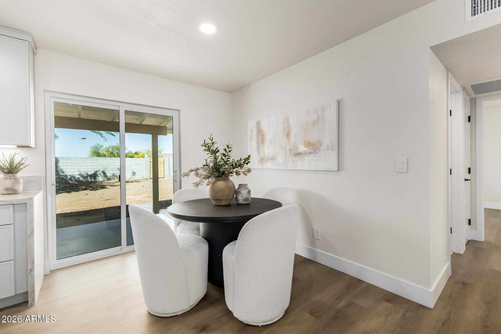 2890 South Mariposa Road Apache Junction, AZ 85119 - Photo 7 of 27 a dining room with furniture and window