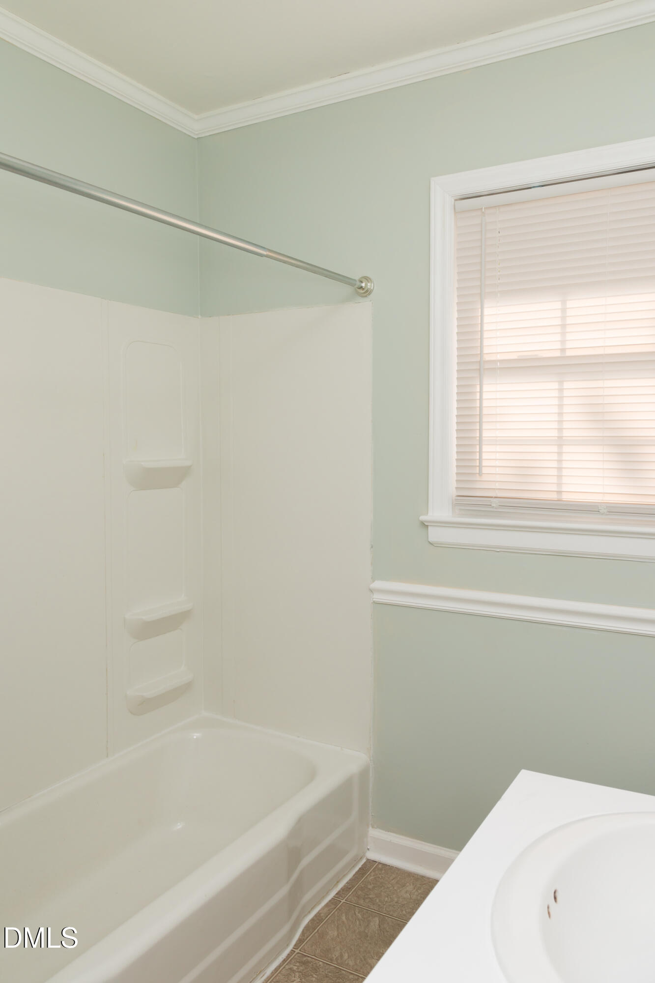 513 North 5th Street Mebane, NC 27302 - Photo 11 of 17 a bathroom with a bathtub and a toilet