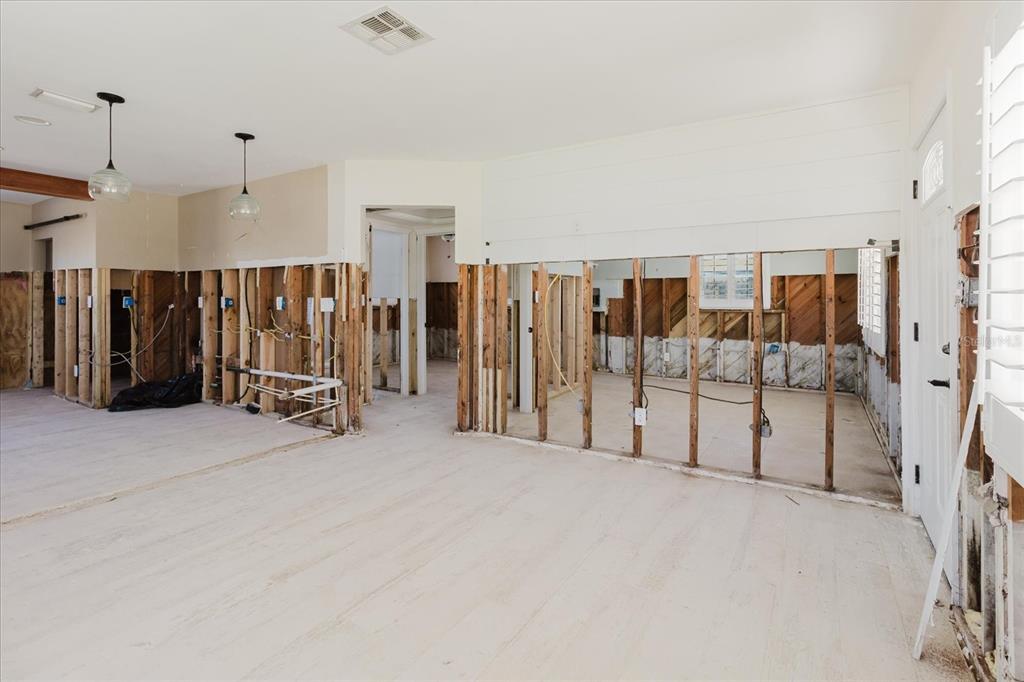 14031 East Parsley Drive Madeira Beach, FL 33708 - Photo 6 of 14 a view of a livingroom with a furniture