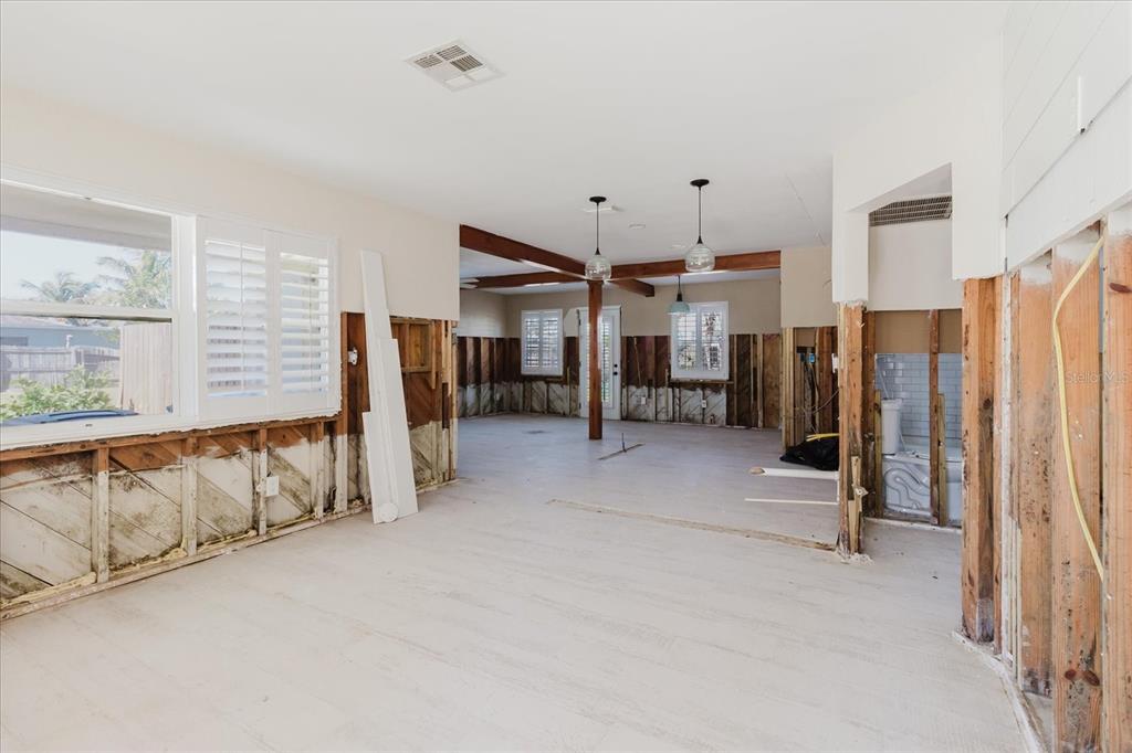 14031 East Parsley Drive Madeira Beach, FL 33708 - Photo 7 of 14 a view of an empty room with a window