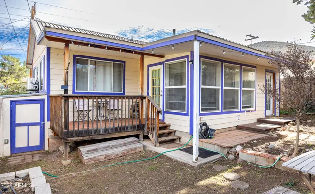 a front view of a house with a porch