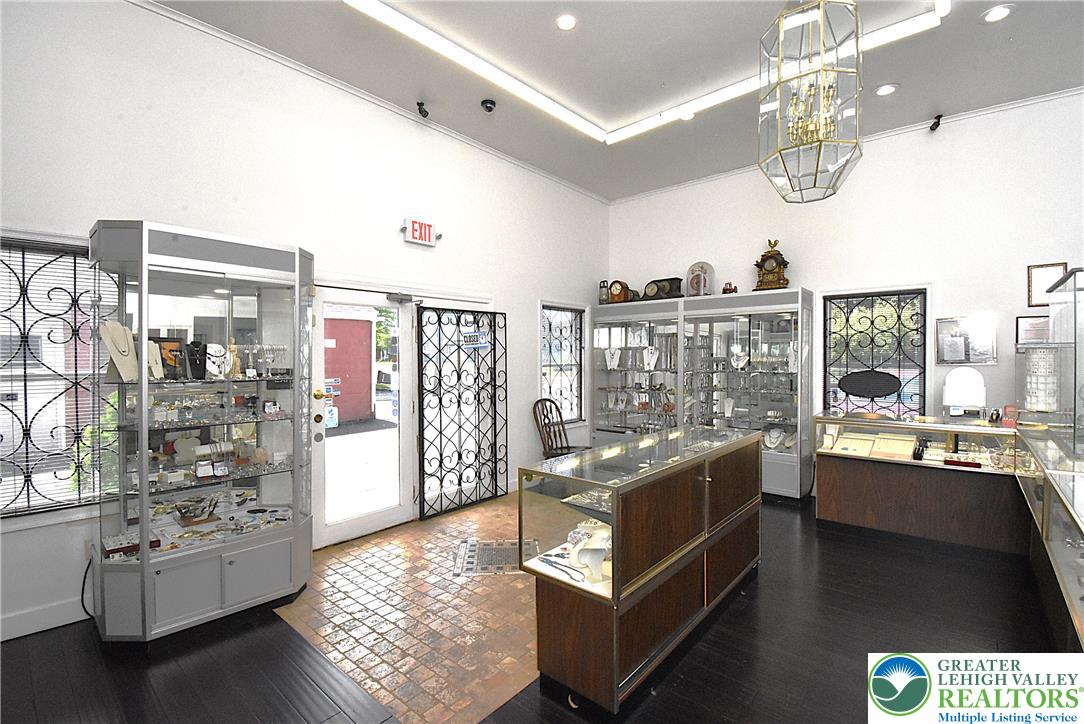 424 Grape Street Whitehall, PA 18052 - Photo 9 of 56 Step inside this elegant space, showcasing varied flooring and ample display cases.