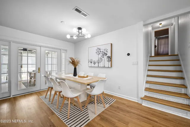 a bathroom with a toilet a sink and a mirror