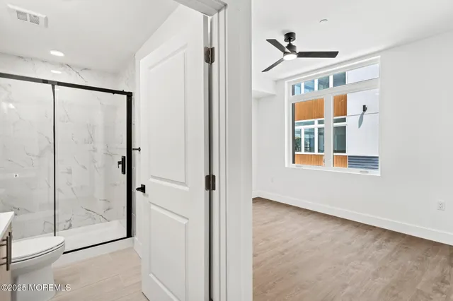 a view of entryway with white walls