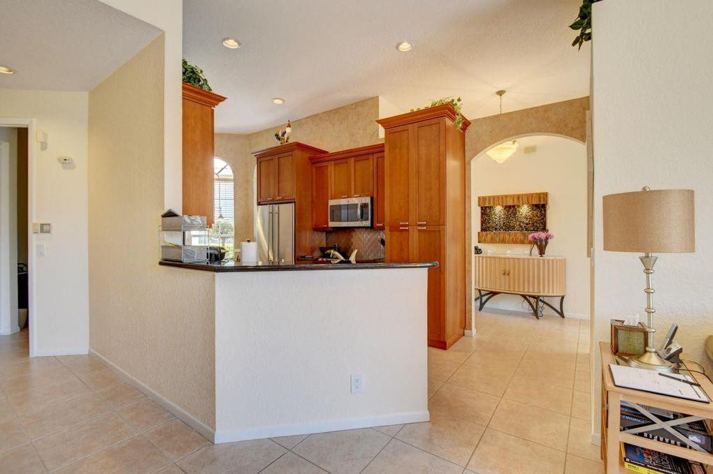 23446 Rakelle Circle Boca Raton, FL 33433 - Photo 7 of 39 Open Kitchen to family room