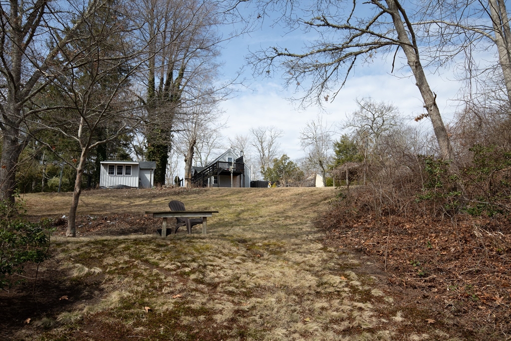 36 Lovell's Lane Mashpee, MA 02649 - Photo 18 of 23 a view of a yard with a tree