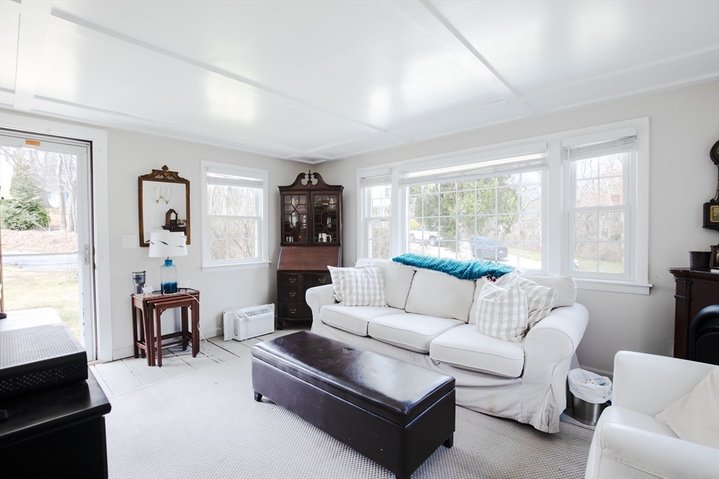 36 Lovell's Lane Mashpee, MA 02649 - Photo 5 of 23 a living room with furniture and a large window