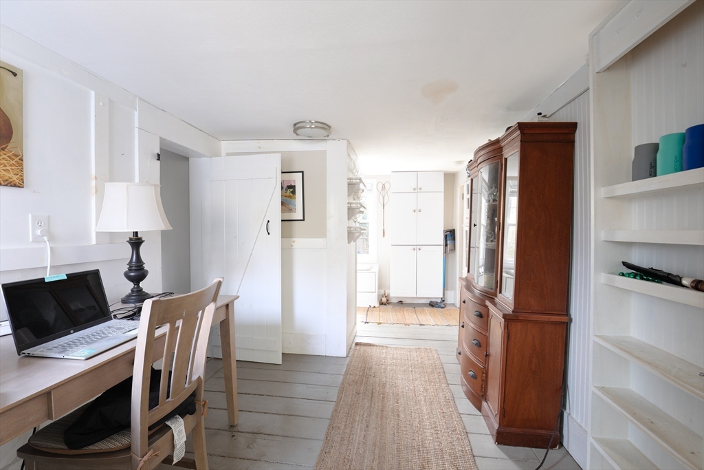 36 Lovell's Lane Mashpee, MA 02649 - Photo 6 of 23 a kitchen with stainless steel appliances a refrigerator and wooden floor
