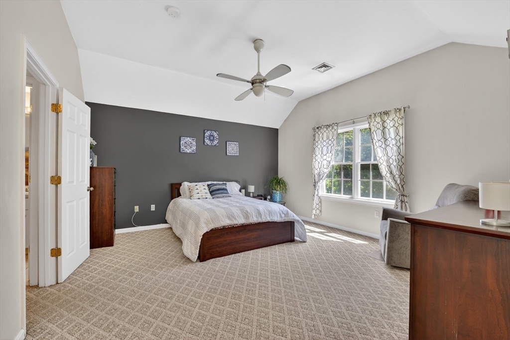 15 Evergreen Circle, Unit 15 Canton, MA 02021 - Photo 15 of 29 a bedroom with a bed and window