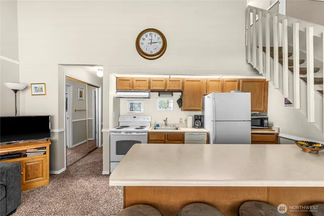 a living room with a couch and a flat screen tv