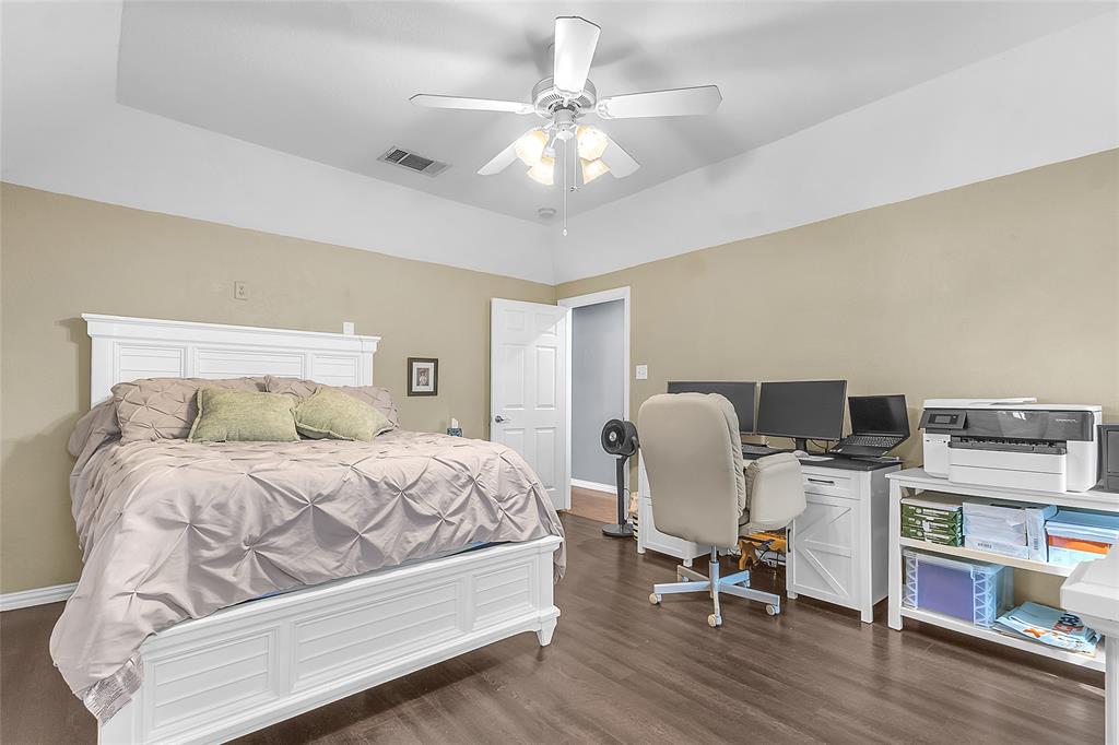 11151 County Road 213 Forney, TX 75126 - Photo 18 of 35 Bedroom featuring dark wood-type flooring and ceiling fan
