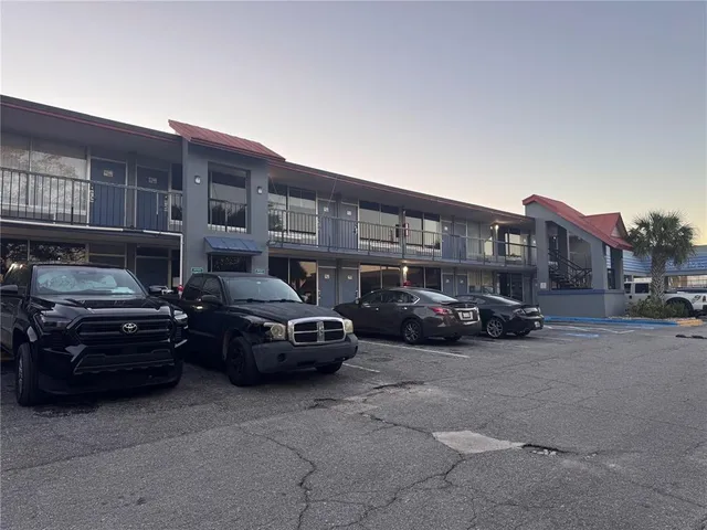 a car parked in front of a building