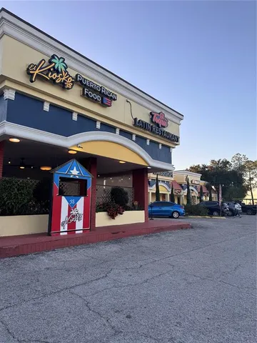 a view of a building with refrigerator