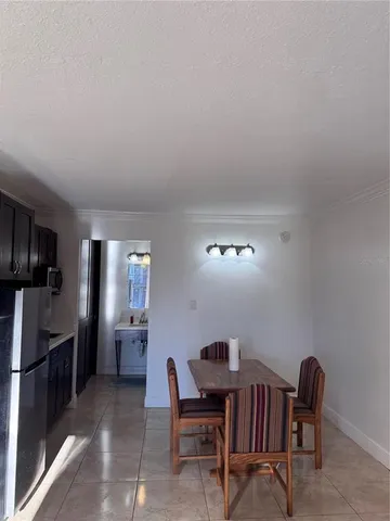 a view of a dining room with furniture