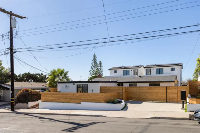 a front view of a house with yard
