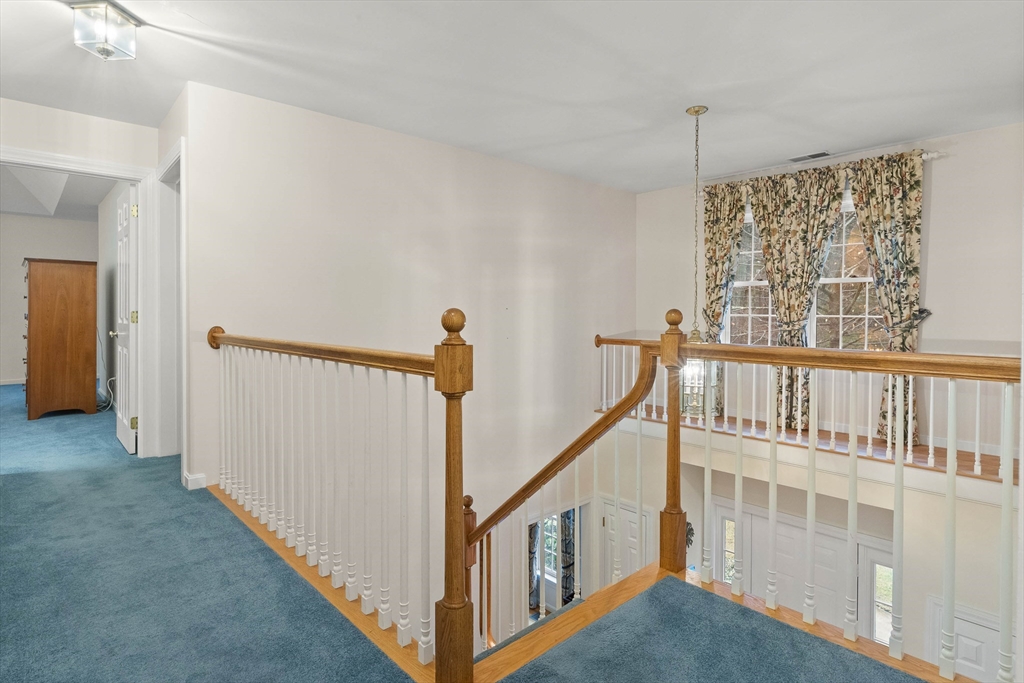 3 Woodland Road Boxford, MA 01921 - Photo 16 of 37 a view of an entryway with staircase