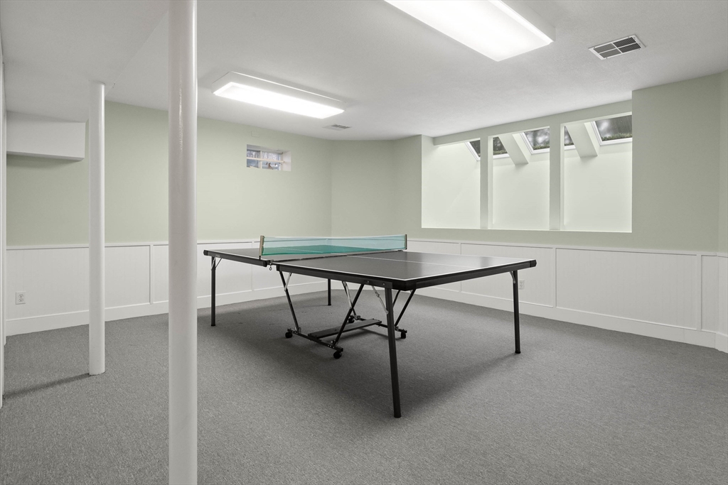 3 Woodland Road Boxford, MA 01921 - Photo 21 of 37 a view of table and chair in the room