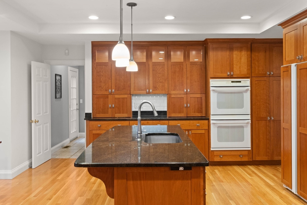 3 Woodland Road Boxford, MA 01921 - Photo 23 of 37 a bathroom with a sink a mirror and a shower
