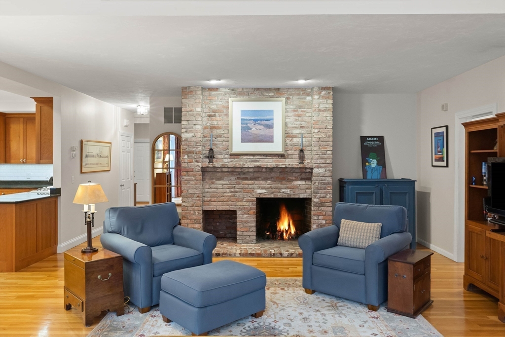 3 Woodland Road Boxford, MA 01921 - Photo 27 of 37 a living room with furniture mirror and a fireplace