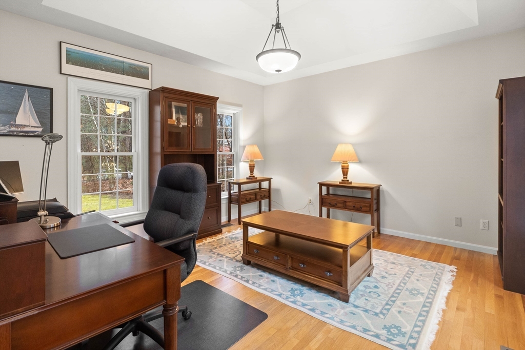 3 Woodland Road Boxford, MA 01921 - Photo 34 of 37 a living room with furniture rug and wooden floor