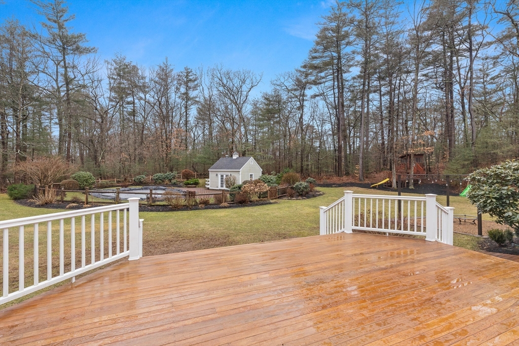 3 Woodland Road Boxford, MA 01921 - Photo 8 of 37 a view of a deck and yard