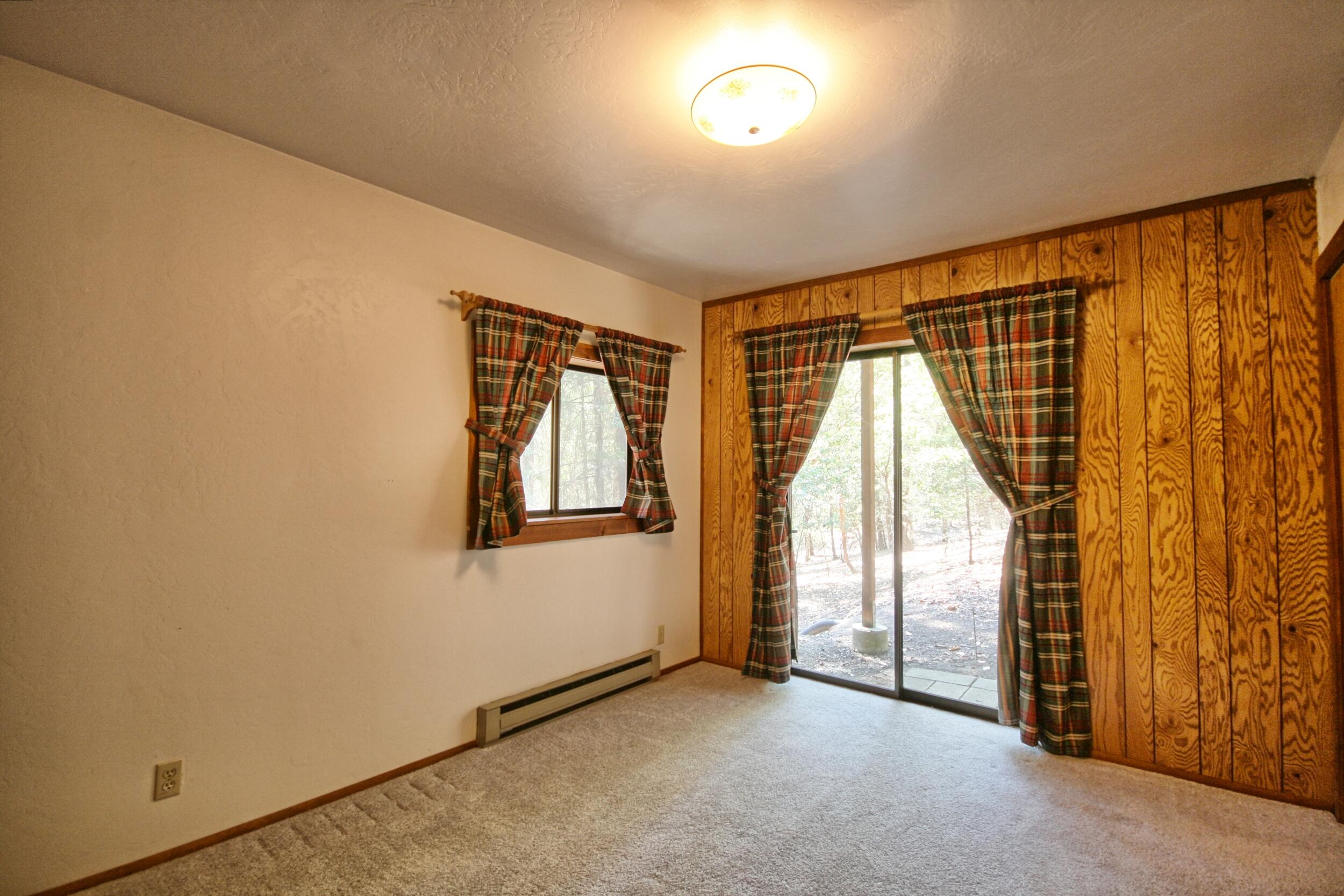 939 Beaver Creek Road Jacksonville, OR 97530 - Photo 40 of 53 direct access to lower level bd
