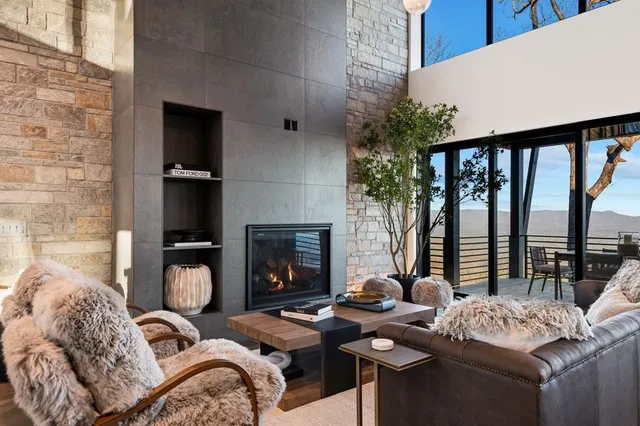 a bedroom with a bed and a mirror