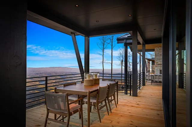 a bathroom with a bathtub and a window