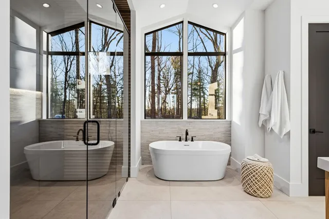 a view of a glass door with a floor to ceiling window and a glass door