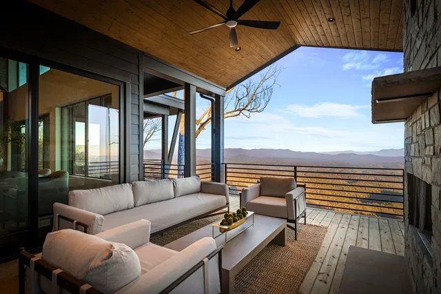 a living room with furniture and a table