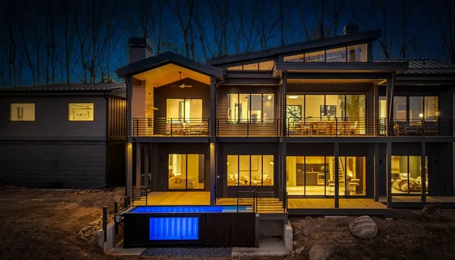 a kitchen with a sink appliances and cabinets