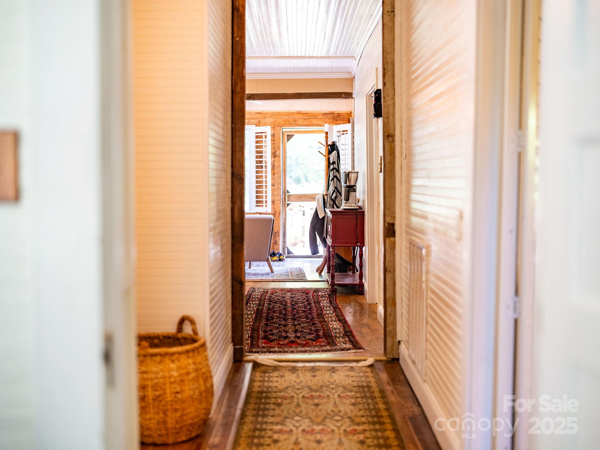 71 Persimmon Lane Canton, NC 28716 - Photo 22 of 25 a view of a balcony and a dining table & chairs