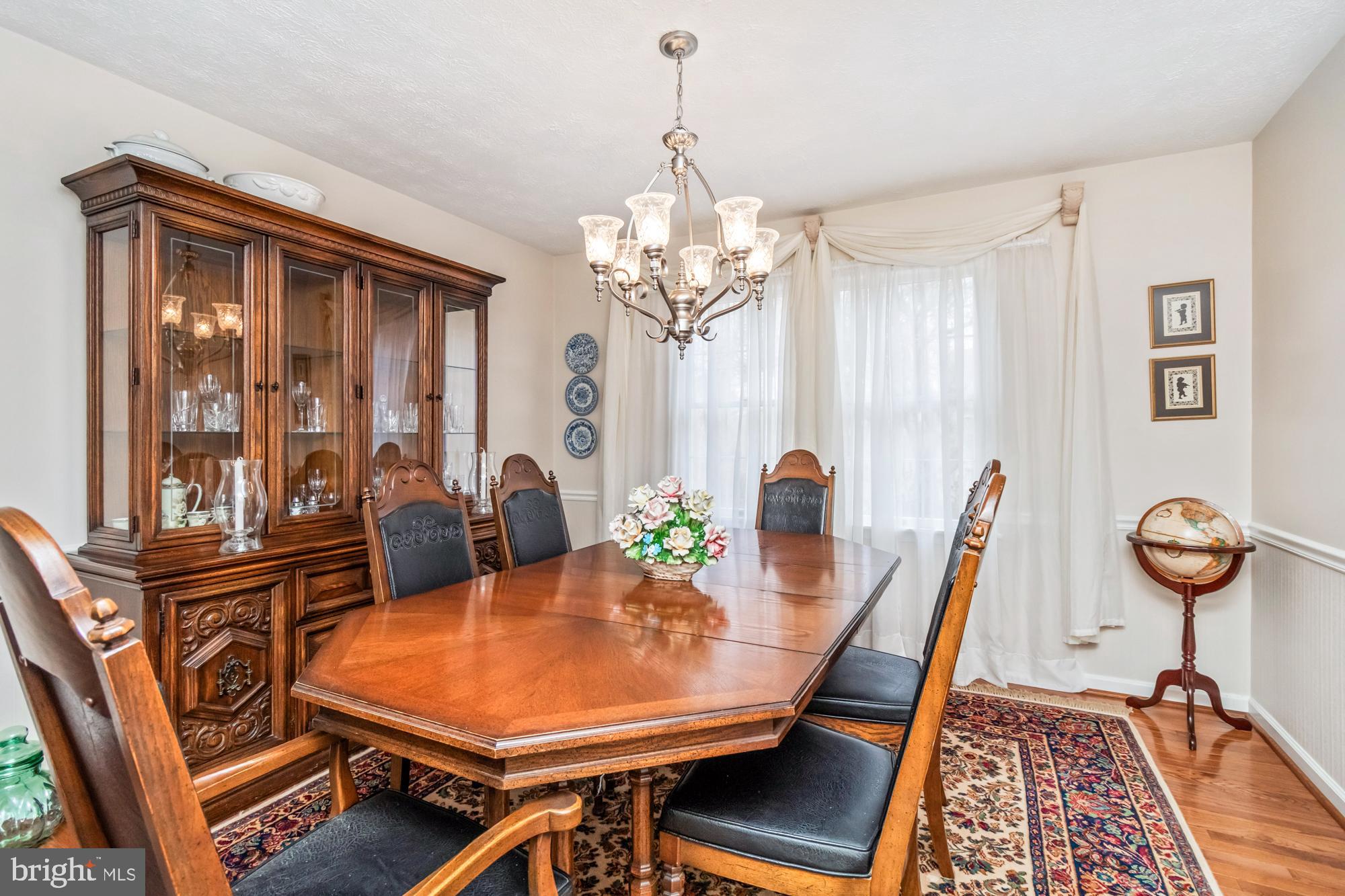 529 Beards Hill Road Aberdeen, MD 21001 - Photo 12 of 65 a view of a dining room with furniture and a chandelier