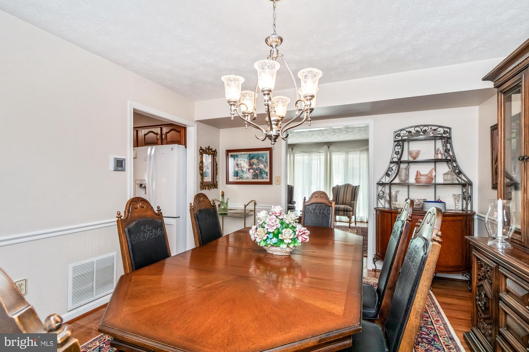 529 Beards Hill Road Aberdeen, MD 21001 - Photo 13 of 65 a view of a dining room with furniture and chandelier
