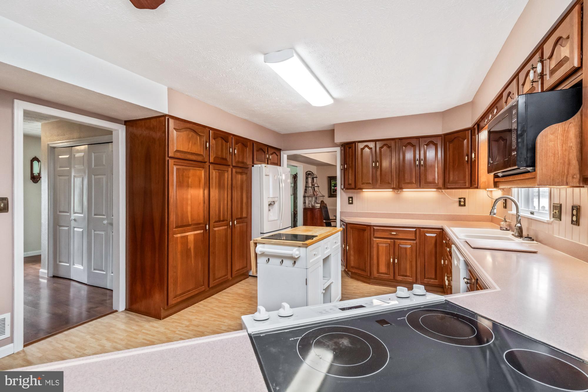529 Beards Hill Road Aberdeen, MD 21001 - Photo 15 of 65 a kitchen with stainless steel appliances granite countertop a stove and a refrigerator
