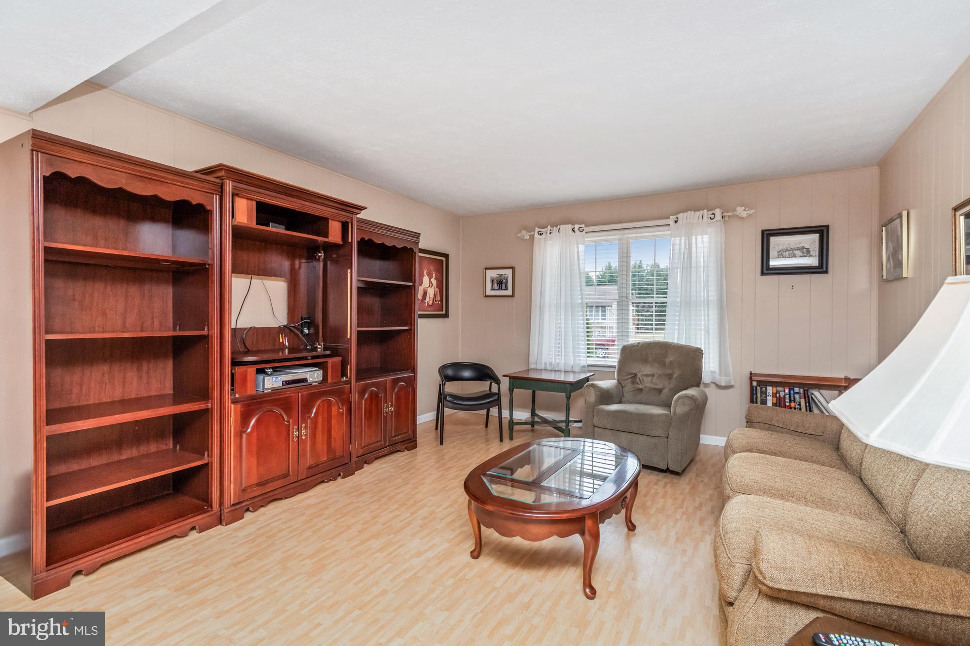 529 Beards Hill Road Aberdeen, MD 21001 - Photo 16 of 65 a living room with furniture and a wooden floor
