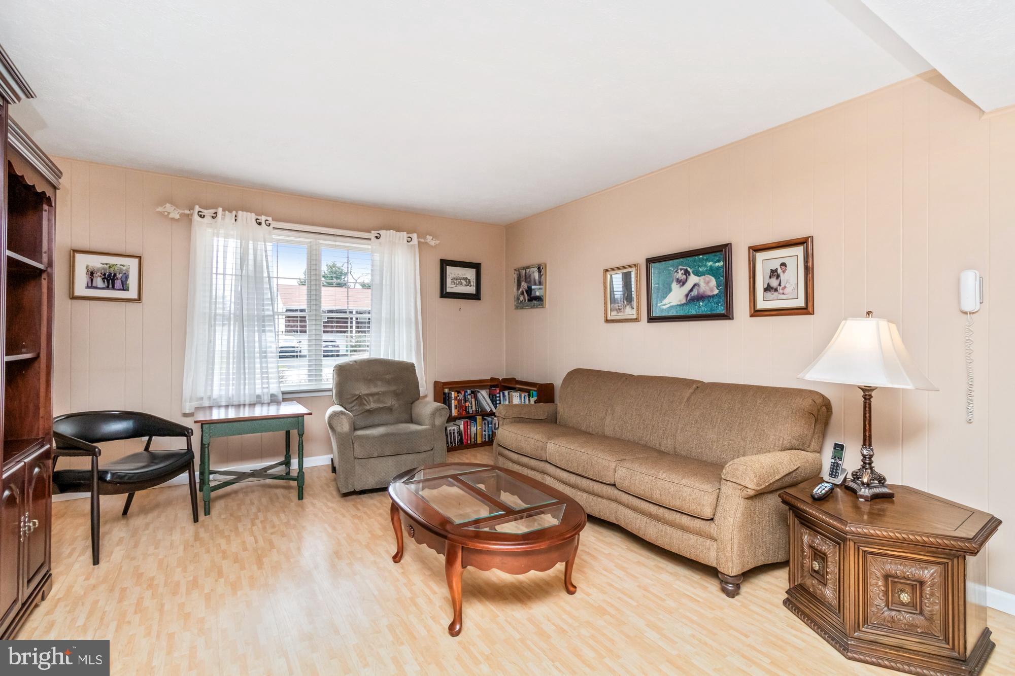 529 Beards Hill Road Aberdeen, MD 21001 - Photo 17 of 65 a living room with furniture and a lamp