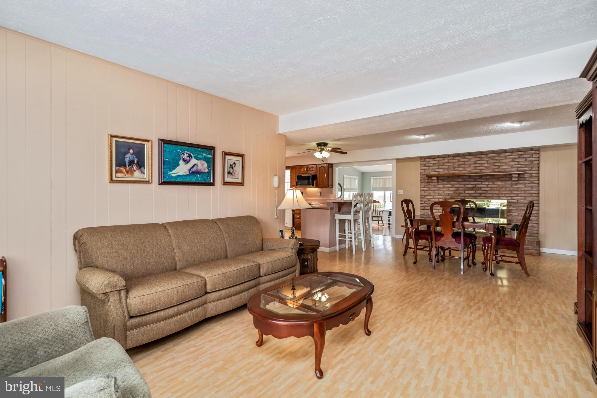 529 Beards Hill Road Aberdeen, MD 21001 - Photo 19 of 65 a living room with furniture and wooden floor