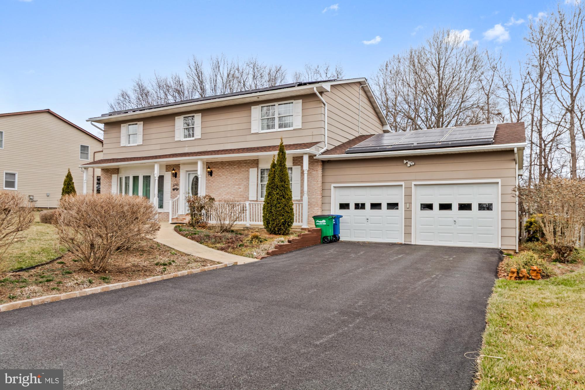 529 Beards Hill Road Aberdeen, MD 21001 - Photo 2 of 65 a front view of a house with a yard and garage