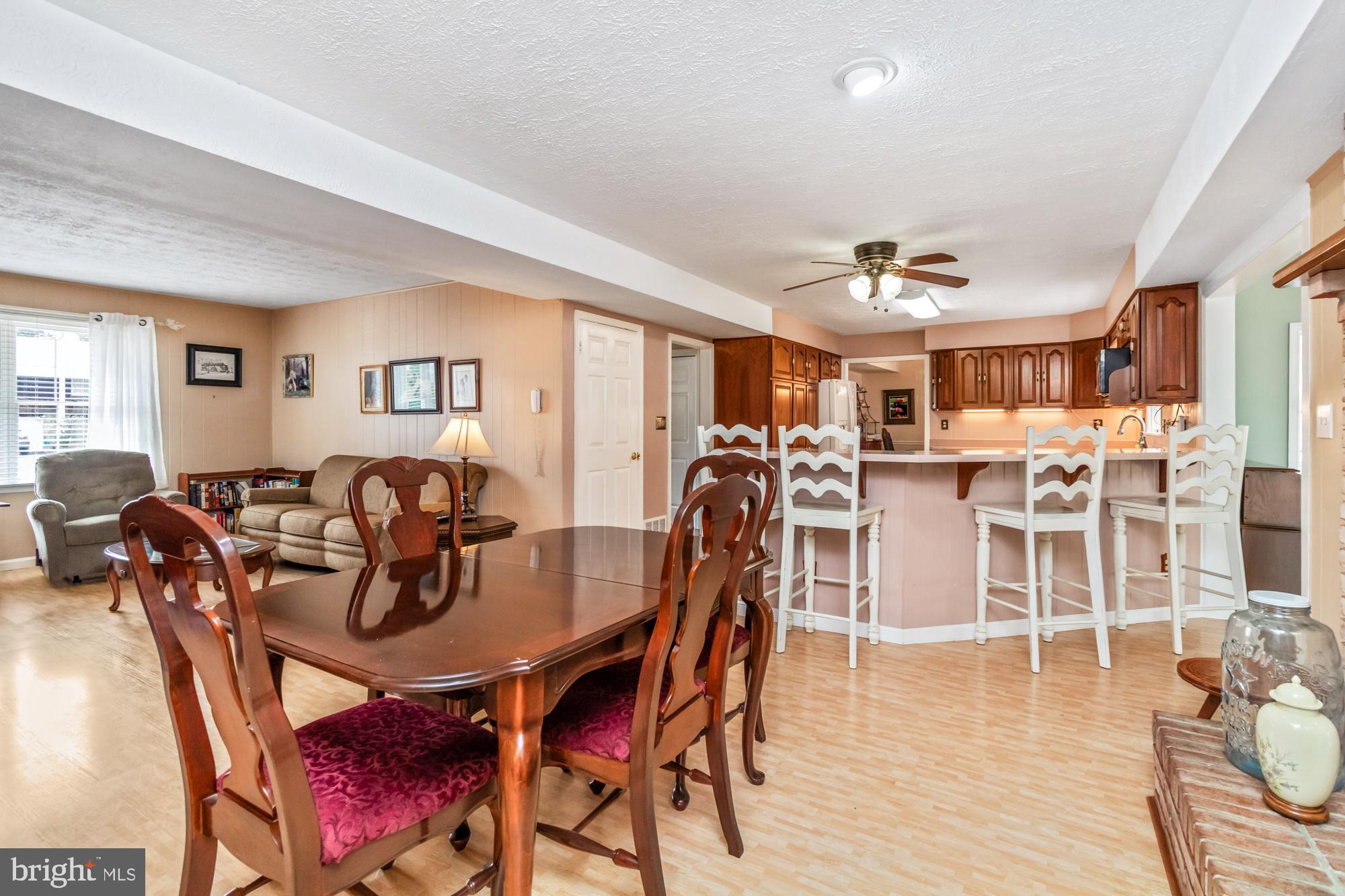 529 Beards Hill Road Aberdeen, MD 21001 - Photo 21 of 65 a view of a dining area with furniture and wooden floor