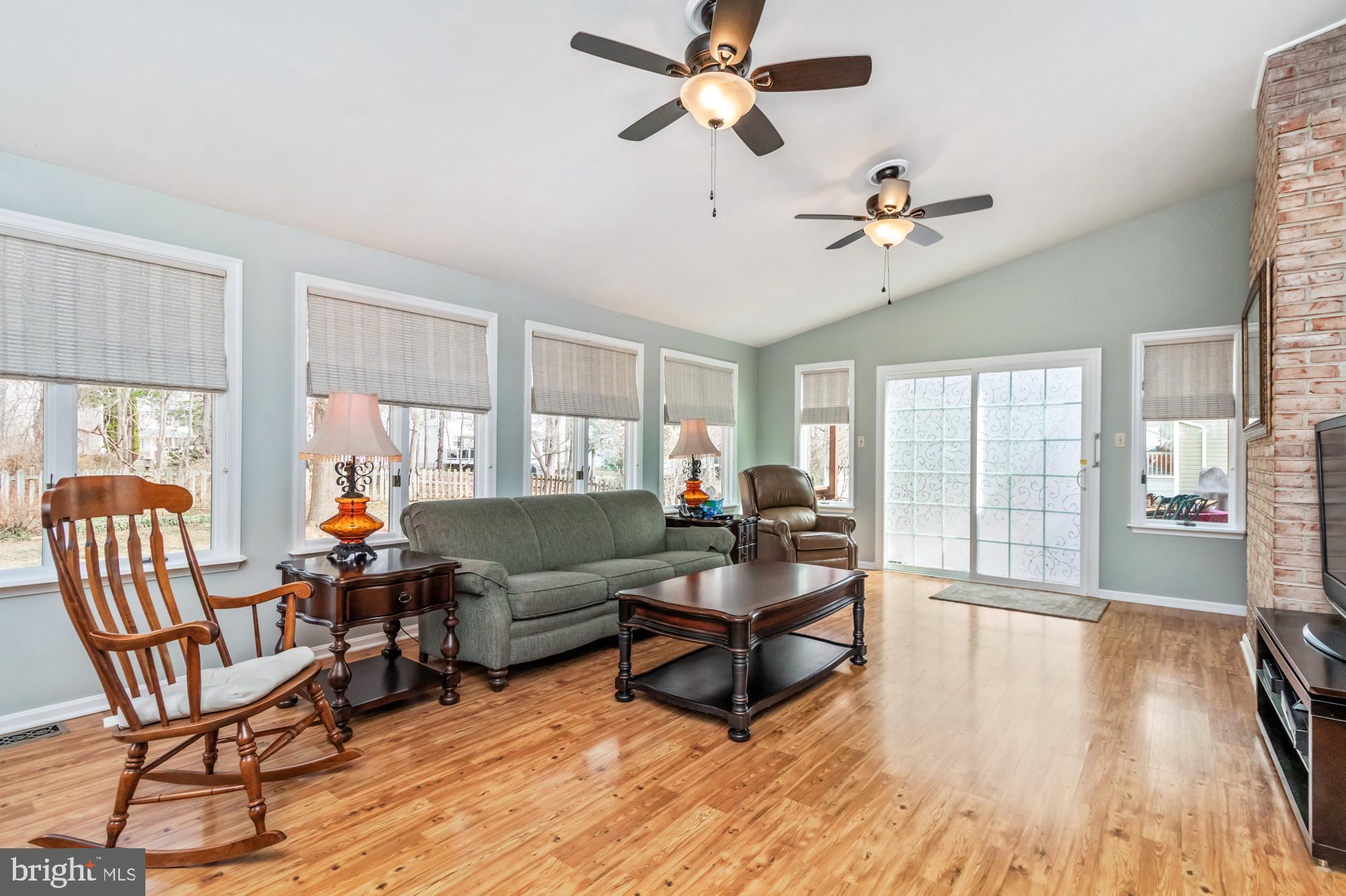 529 Beards Hill Road Aberdeen, MD 21001 - Photo 25 of 65 a living room with furniture and a wooden floor