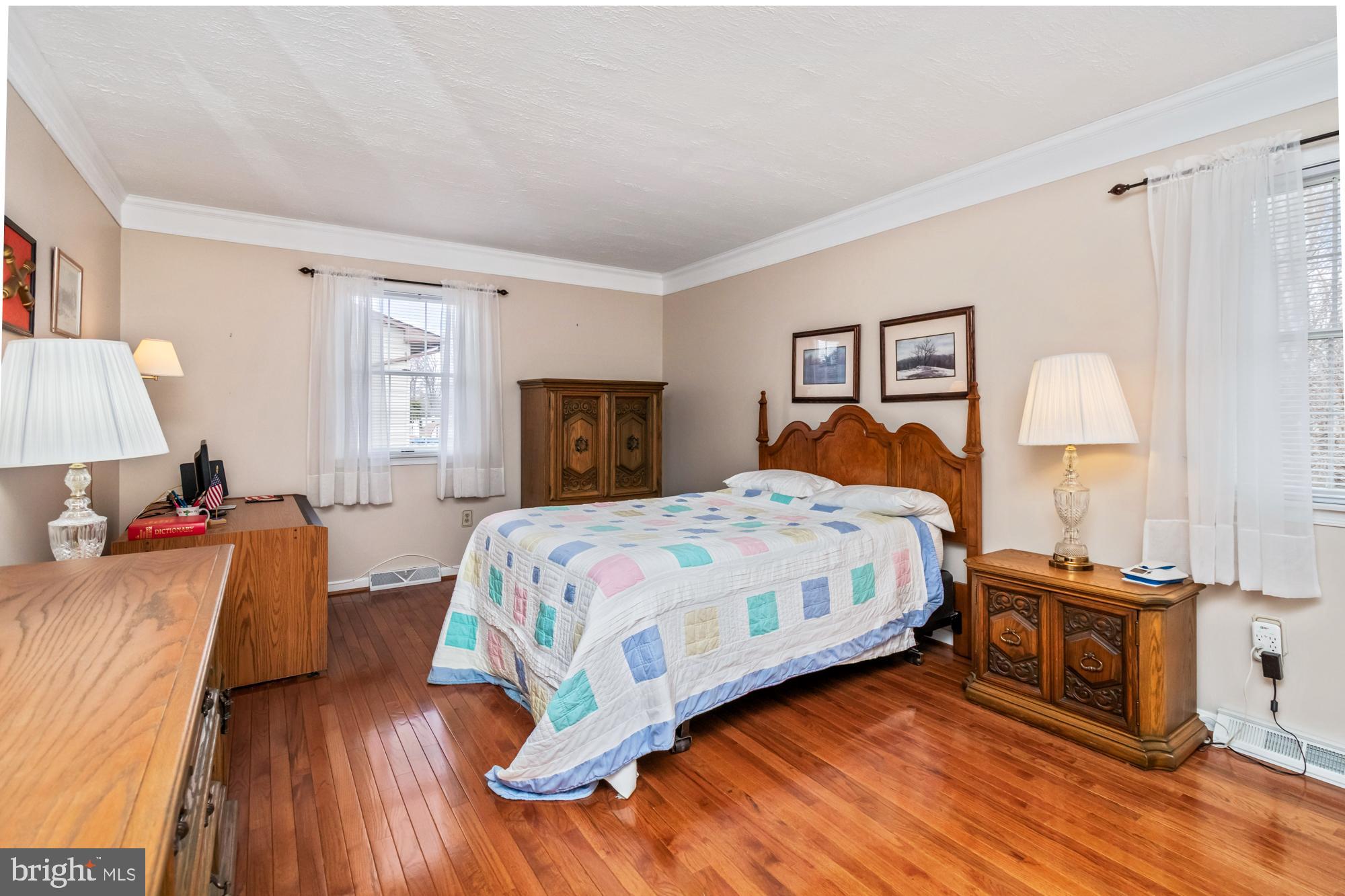 529 Beards Hill Road Aberdeen, MD 21001 - Photo 42 of 65 a bedroom with a bed and wooden floor