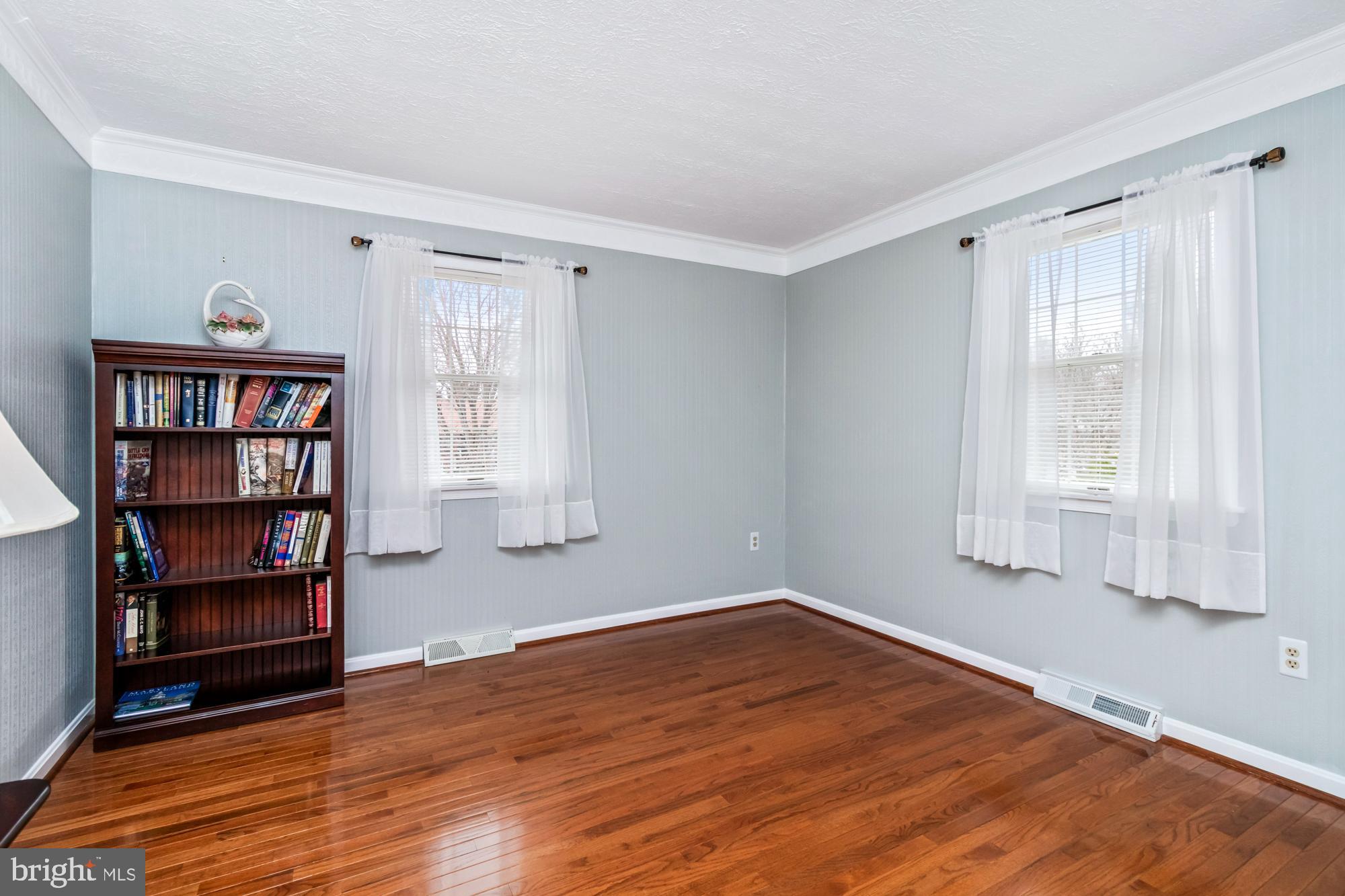 529 Beards Hill Road Aberdeen, MD 21001 - Photo 45 of 65 a view of empty room with wooden floor and fan