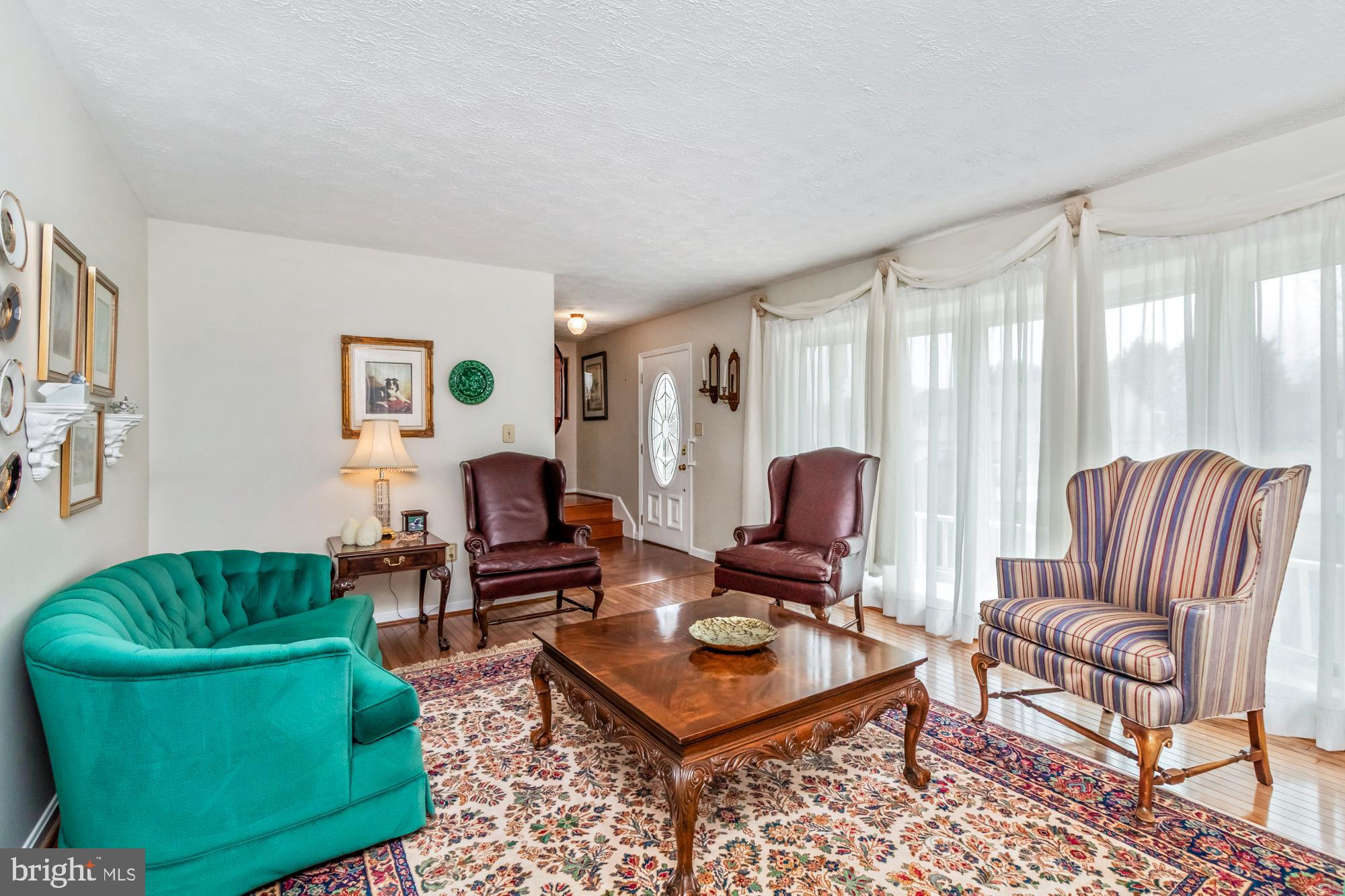 529 Beards Hill Road Aberdeen, MD 21001 - Photo 10 of 65 a living room with furniture and a large window