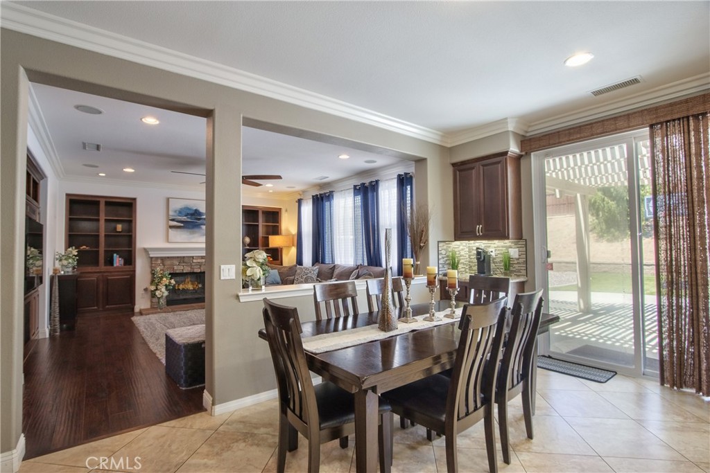 28483 Nautical Point Circle Menifee, CA 92585 - Photo 6 of 44 a view of a dining room with furniture and window