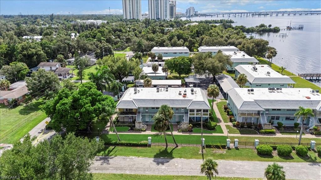 3225 East Riverside Drive, Unit 17A Fort Myers, FL 33916 - Photo 24 of 30 View of urban area featuring a nearby body of water and a notable bridge