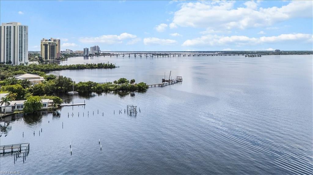 3225 East Riverside Drive, Unit 17A Fort Myers, FL 33916 - Photo 30 of 30 Water view featuring a notable bridge