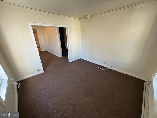 a view of a room with an empty space