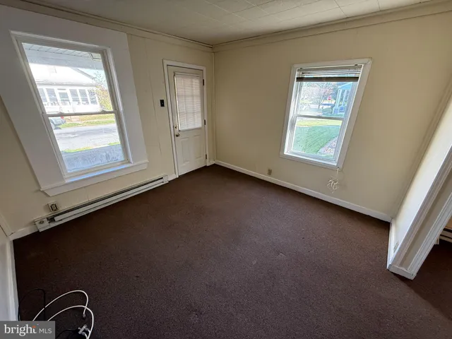 an empty room with windows