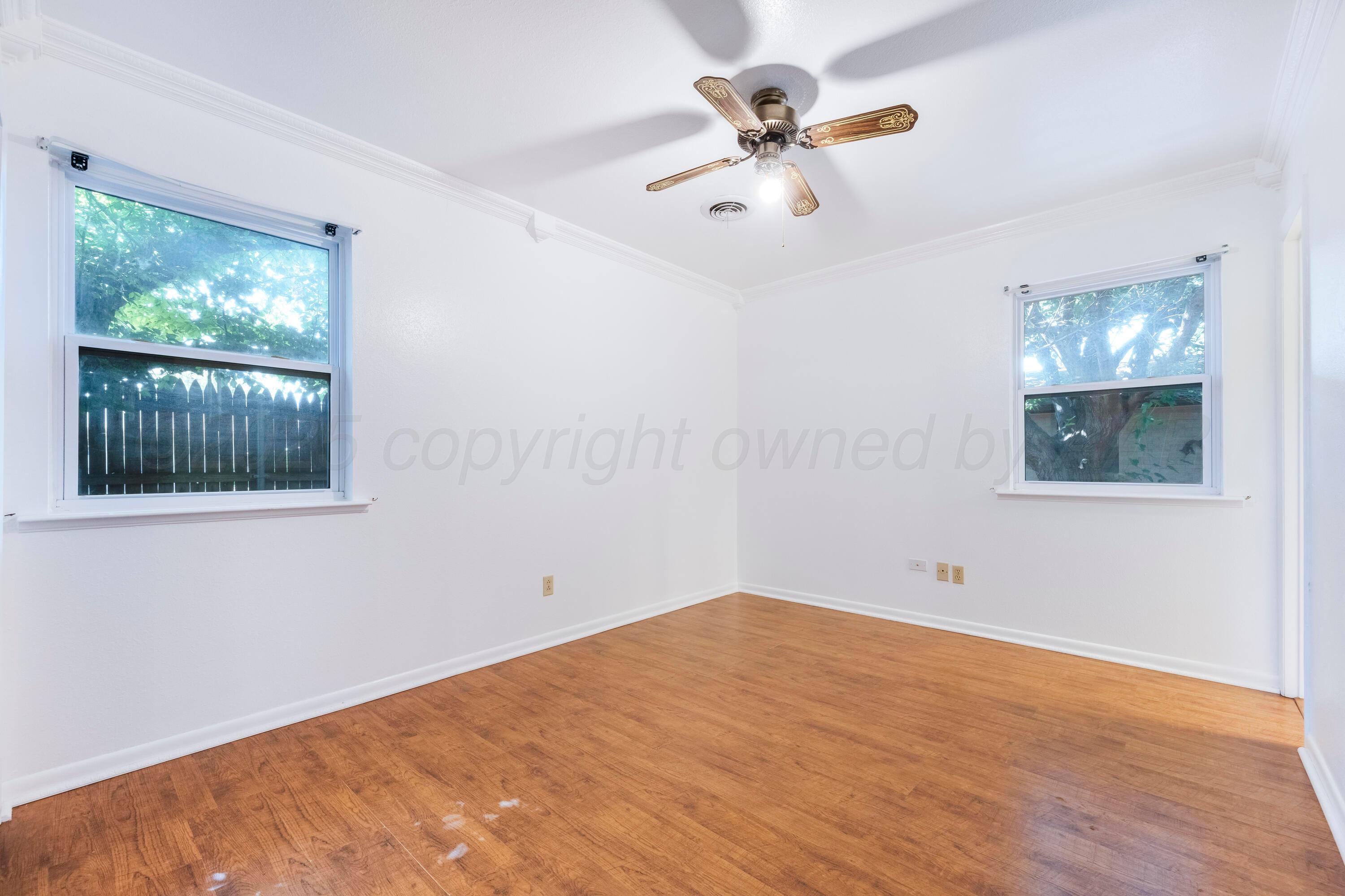 2401 Darrell Avenue Amarillo, TX 79110 - Photo 21 of 35 a view of an empty room with a window